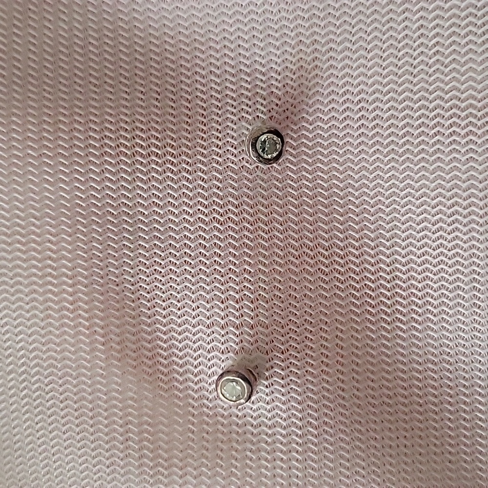 Sterling silver earrings with cubic zirconia.